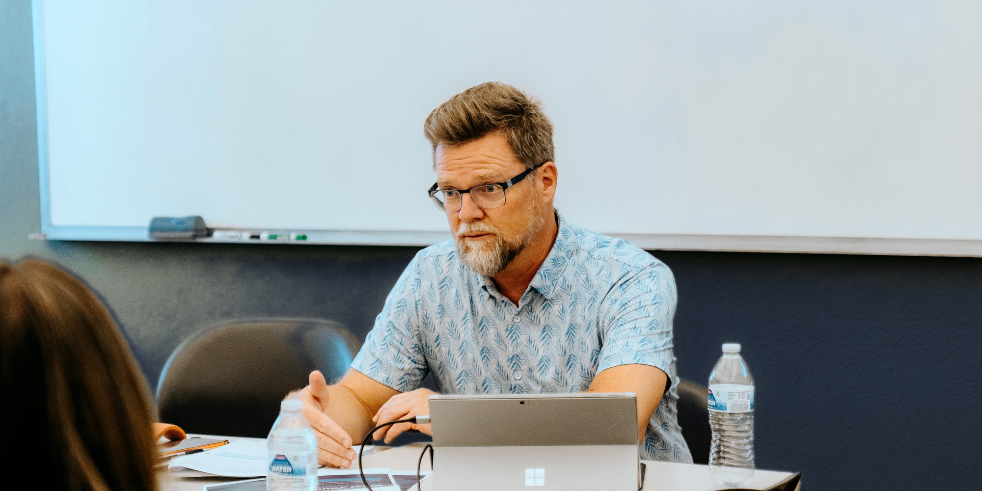 Christian Moller-Andersen leading a leadership working session around a conference table